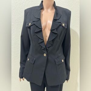 A cute black blazer see from White House Black Market!